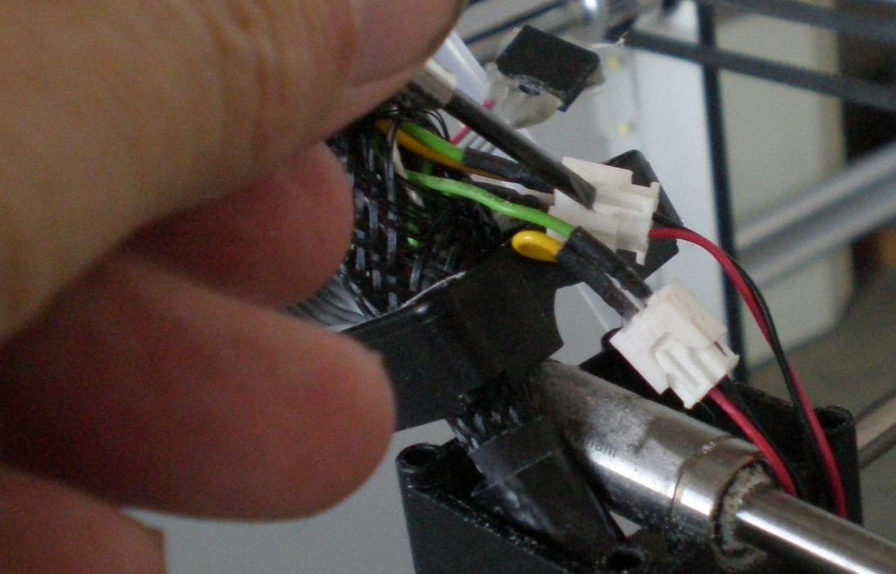 Disconnect the fan connectors. (use small screwdriver).Lead the